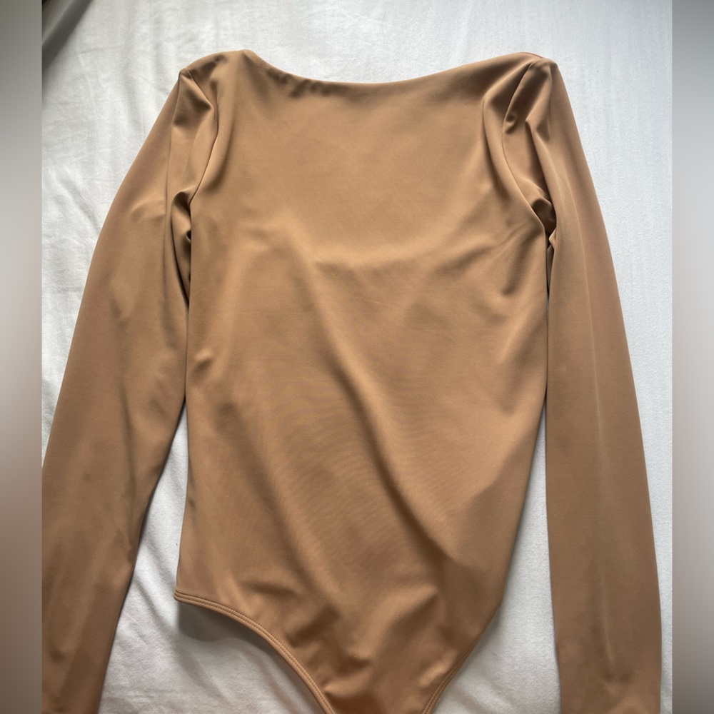 Express beige long sleeve bodysuit.